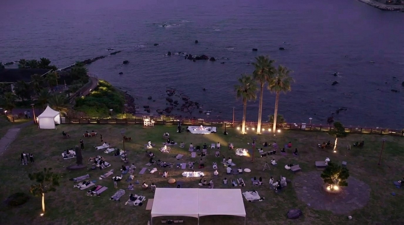 An outdoor public cultural program by the sea in Jeju